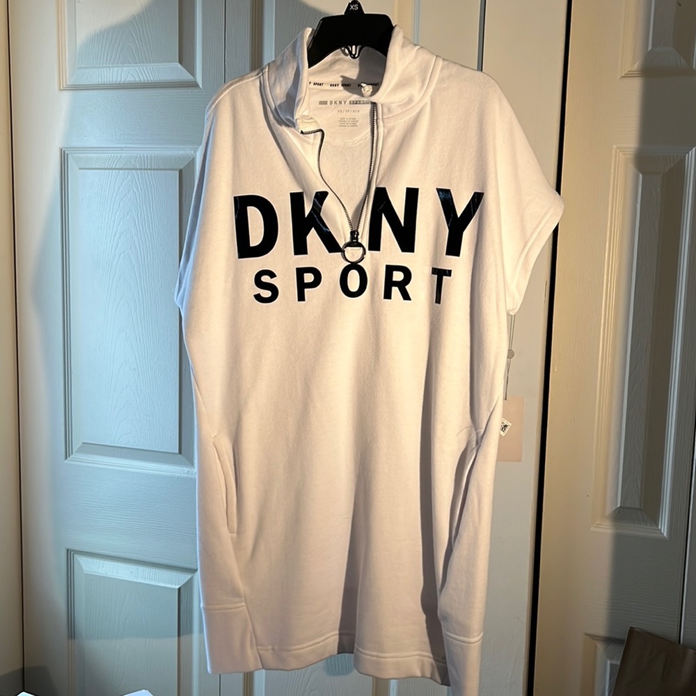 XS DKYN sport short leave athletic dress. White dress with black lettering.